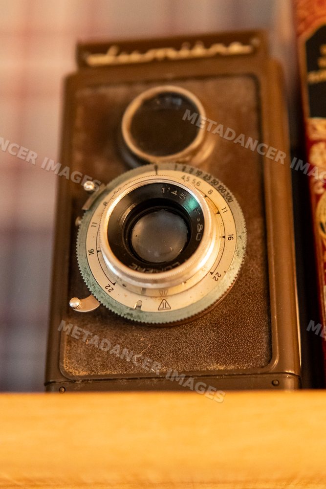 Close-up view of a vintage camera with manual dials