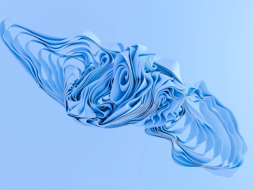 A smooth blue abstract shape with flowing folded layers on a pale blue background.