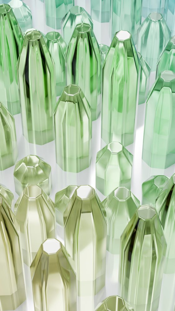 Digital 3D illustration of a cluster of green faceted crystals with hexagonal shapes and reflective surfaces arranged closely together.