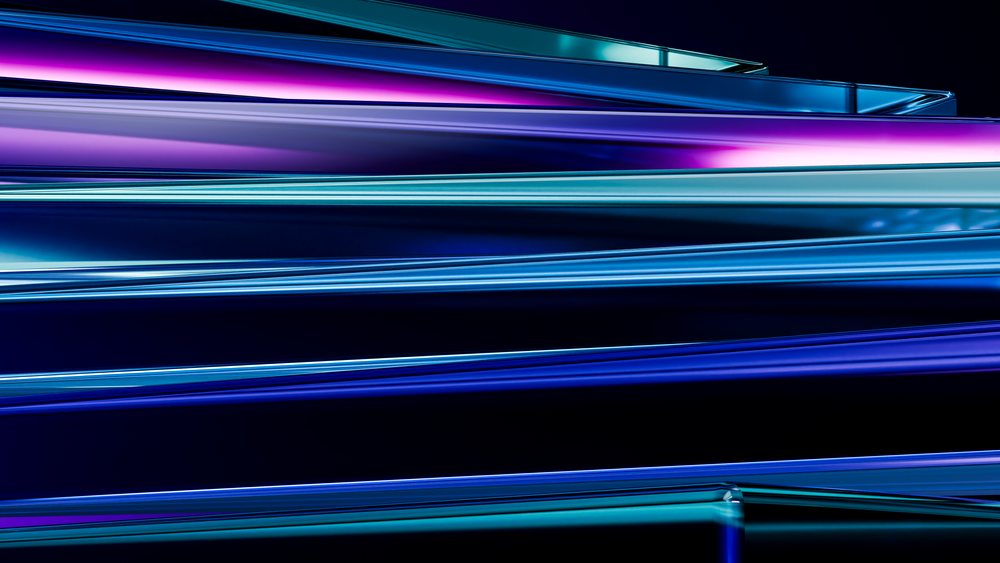 Abstract blue and purple 3D-rendered glass layers feature smooth textures and reflective surfaces with gradient coloring.