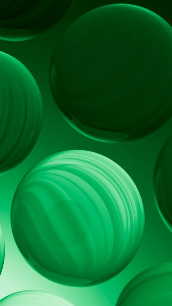 Green glowing spheres float in an abstract digital composition with layered circular textures and soft gradients.