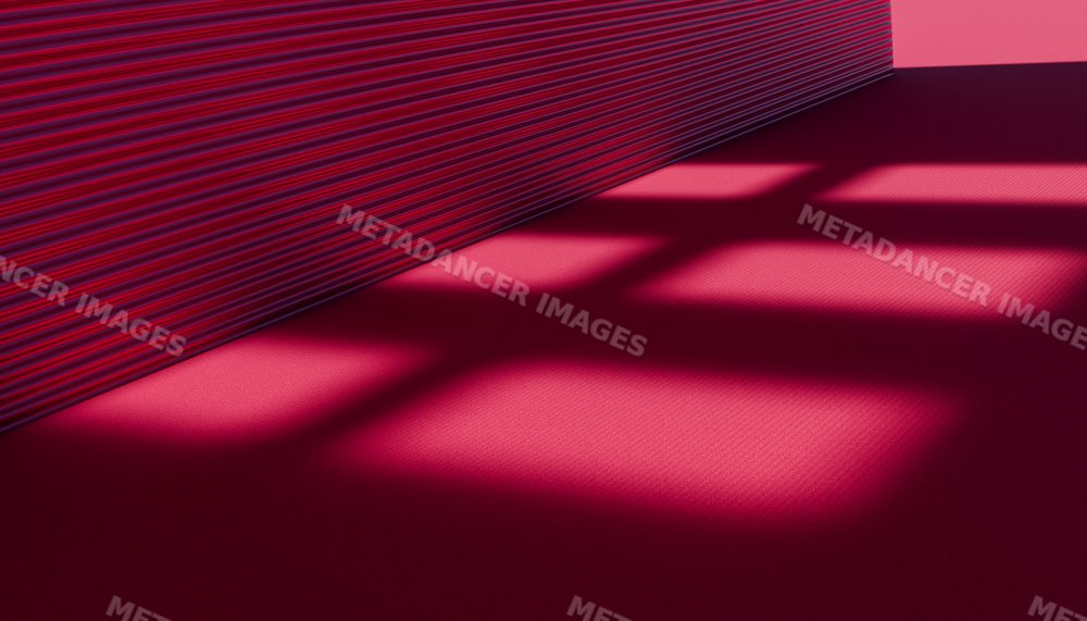 Stack of red paper sheets casting geometric shadows on a red surface