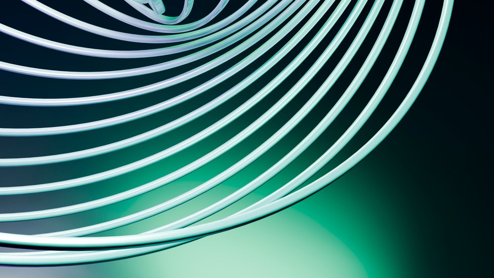 Glowing concentric neon light rings form an abstract futuristic digital art design on a dark background.