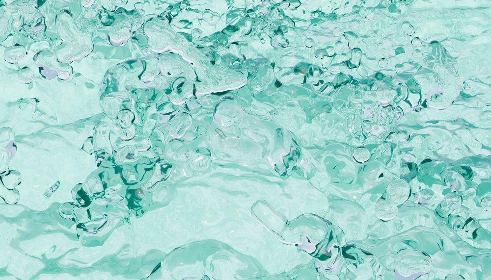 Clear blue water splashes and droplets creating dynamic liquid texture.