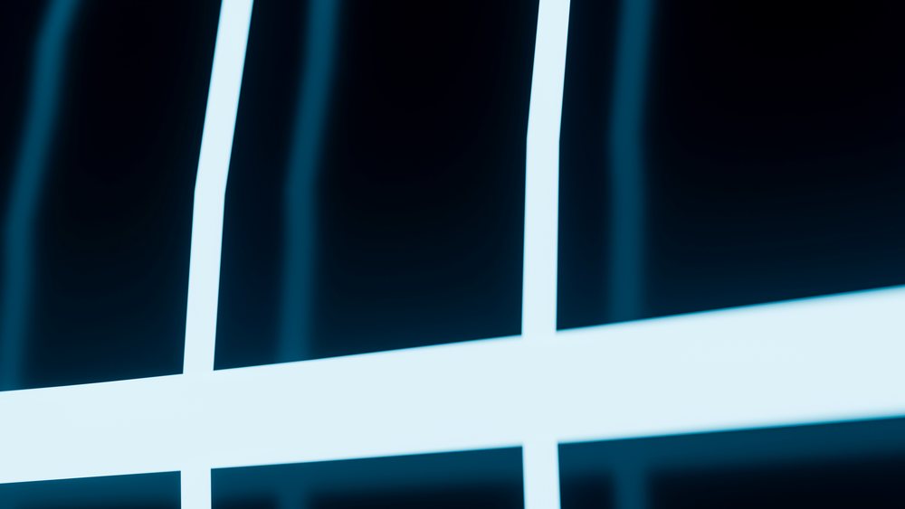 Digital illustration showing glowing blue lines creating a geometric pattern on a black background.