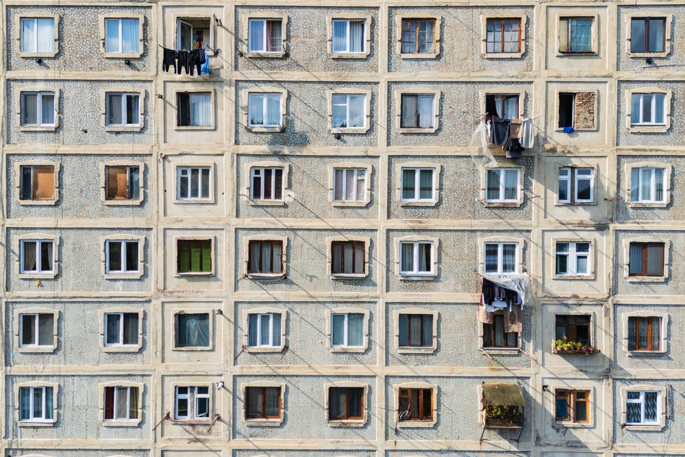 Soviet-Style Apartment Blocks with windows and laundry hanging, Borjomi, Georgia.