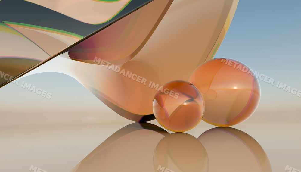 Two orange glass spheres with abstract large glass sculpture