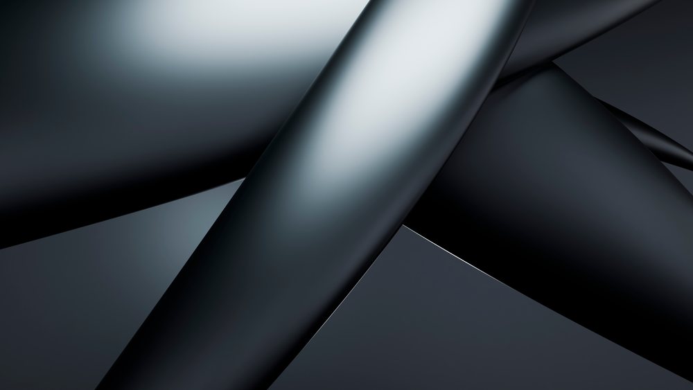 Abstract composition featuring overlapping shiny smooth black curved surfaces forming modern minimalist geometric art.