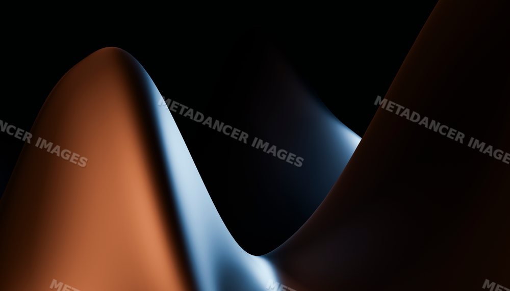 Abstract curved shapes illuminated with blue and orange lighting