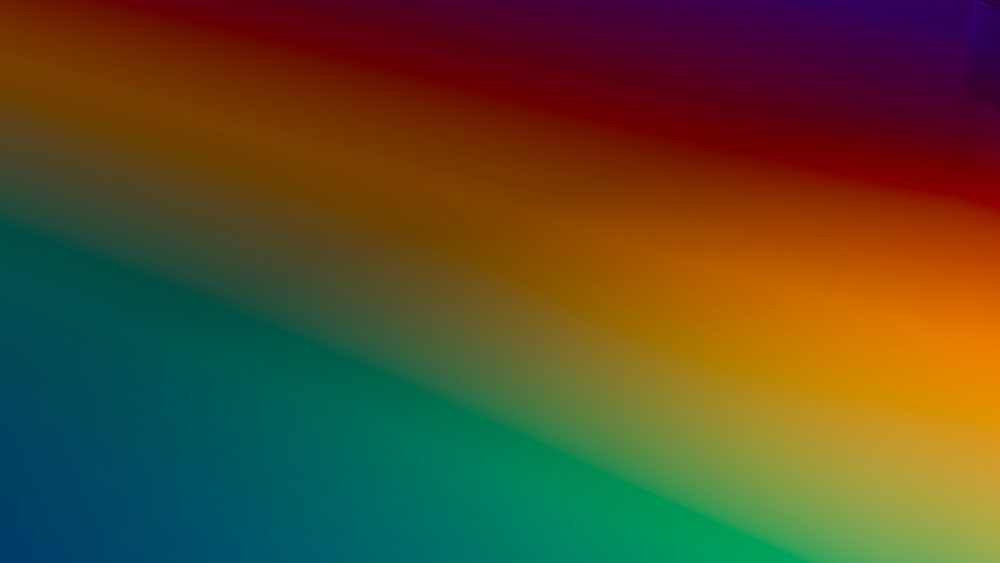 Abstract digital illustration showing a smooth gradient with vibrant blended colors.