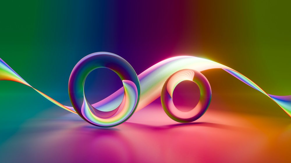 Two colorful glowing rings connected by a luminous flowing ribbon in an abstract vibrant digital illustration with smooth curves.