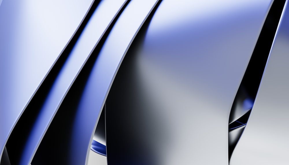 Abstract digital render of smooth blue and gray curved reflective forms.