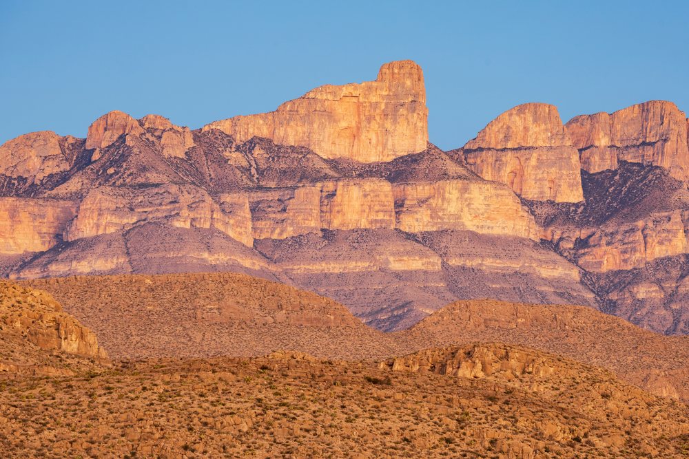 The Sierra del Carmen Range glows with warm Sunset light over, landscape, wildlife, Big Bend National Park, Texas, USA.