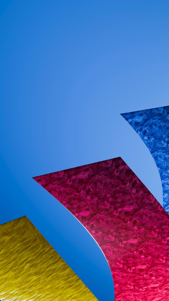 Curved colored glass sheets with textured surfaces form an abstract digital illustration against a blue background.