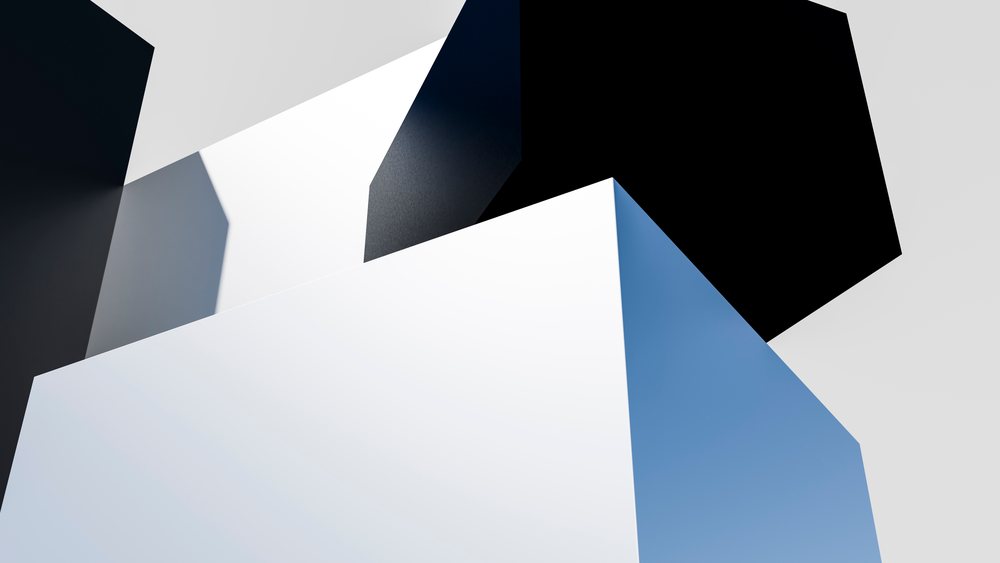 Abstract 3D cubes with black and white faces cast sharp shadows in a minimalistic modern digital illustration.
