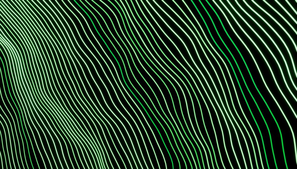 Abstract digital artwork featuring green glowing wave-like lines on a dark background.