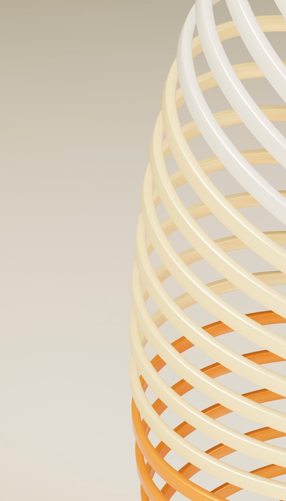 Stacked orange, cream, and white rings arranged in a smooth vertical spiral pattern as an abstract decoration.
