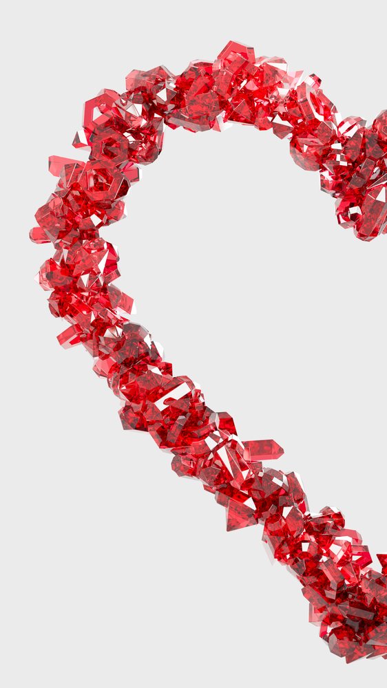 3D illustration of a heart shape formed by multiple shiny red transparent faceted crystals on a white background.