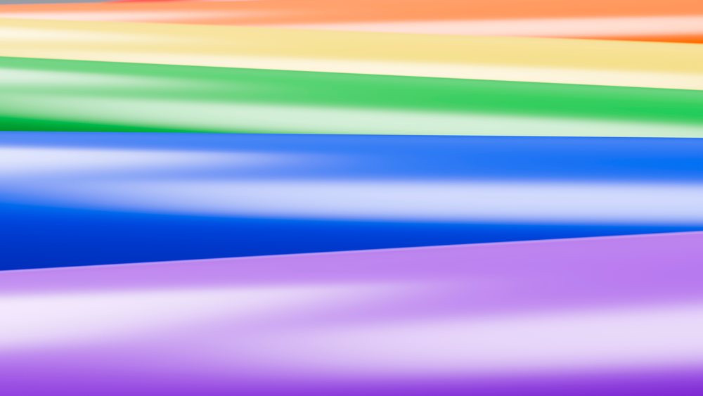 Abstract image featuring smooth horizontal bands transitioning in a vibrant gradient from orange through purple.