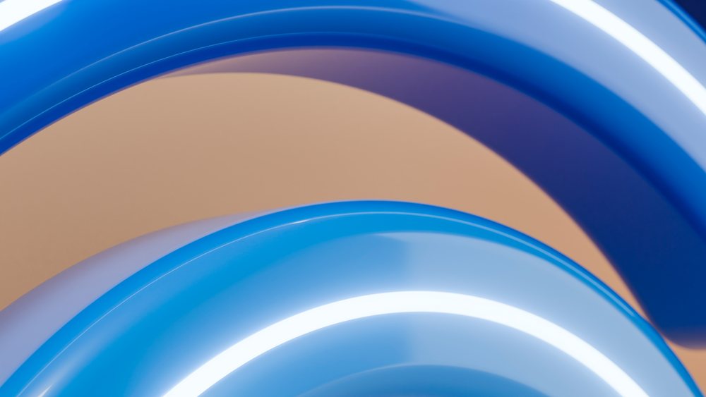 Blue glowing curved rings forming abstract circular shapes in a modern digital 3D illustration.