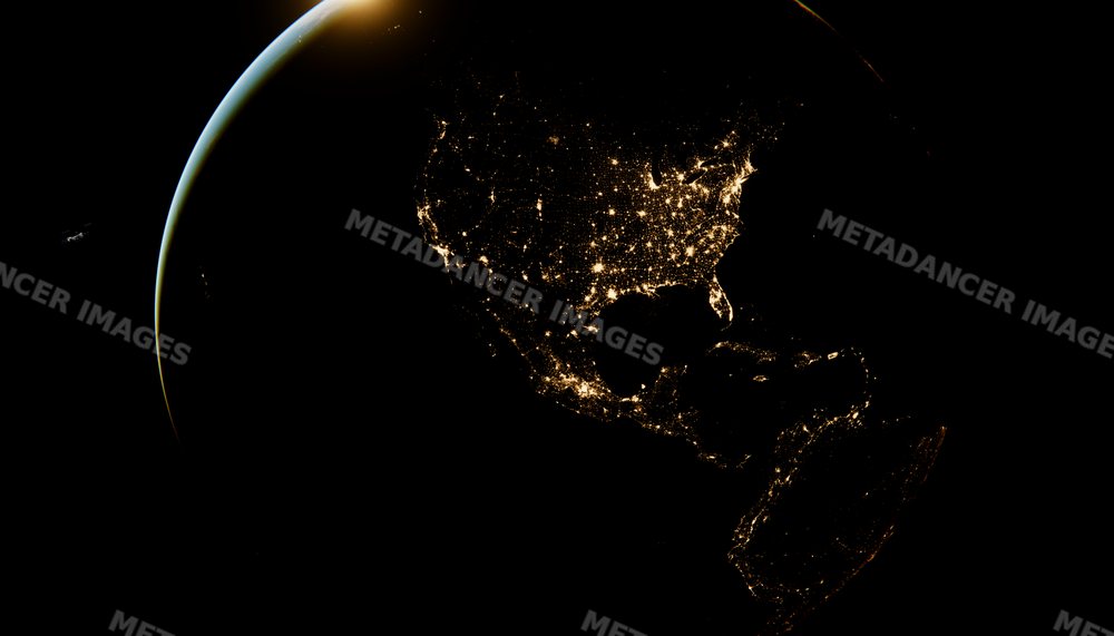 Earth at night illuminated by city lights across north and central