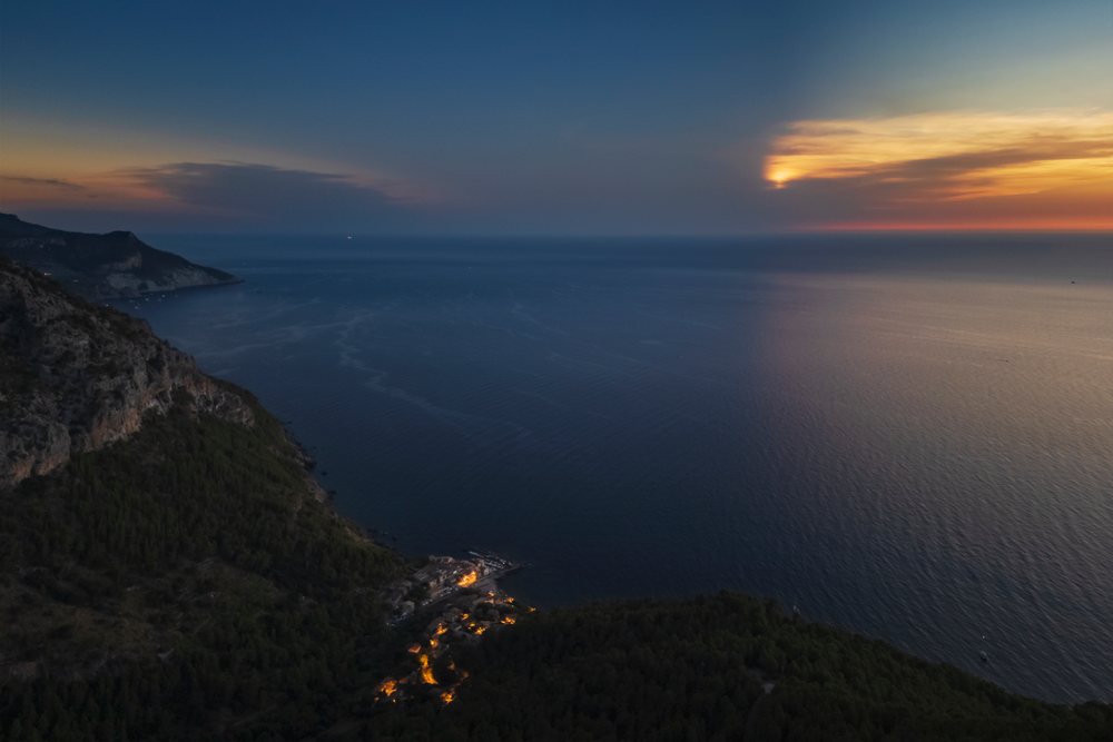 Total eclipse of the Sun obscured by Cloud over sea at sunset, Landscape, Lifestyle, Valldemossa, Mallorca, Spain.