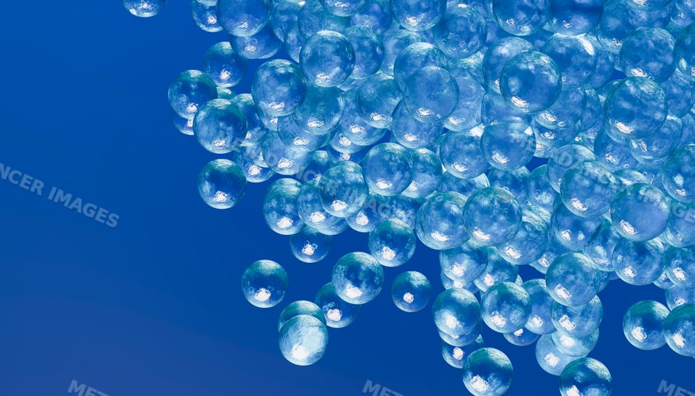 3d digital rendering of transparent blue spheres floating in cluster
