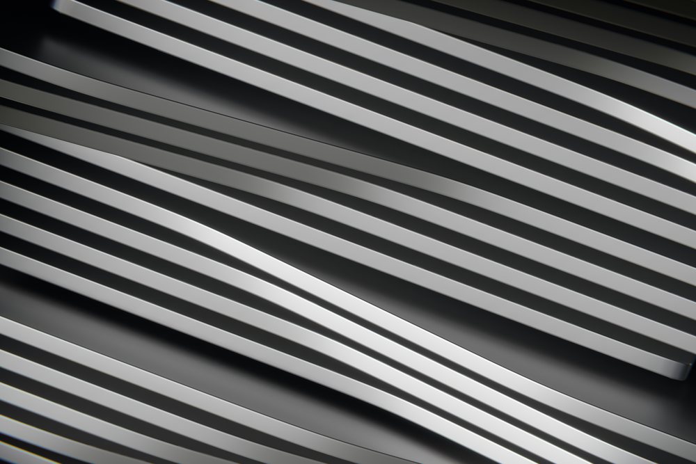 metal bars arranged in parallel lines with a silver abstract render background.