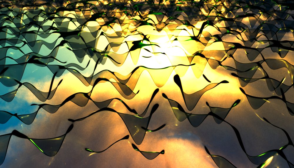 Abstract fluid translucent waves illuminated by golden light creating a dynamic artistic pattern.