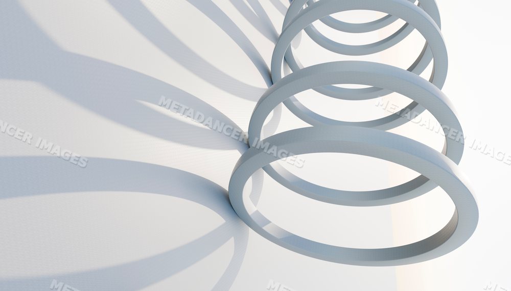 White circular rings create an abstract geometric pattern with shadows