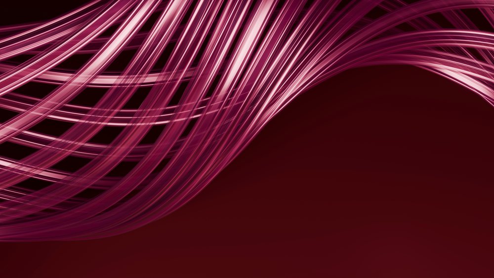 Abstract composition of flowing translucent pink strands creating dynamic curved lines and wave patterns over a dark red background with glowing light reflections.