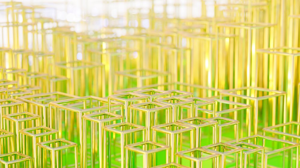 Glass tubes arranged in a geometric pattern with yellow tinted lighting creating a modern abstract composition.
