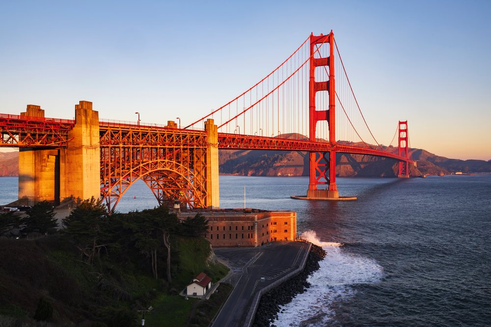 Golden Gate Bridge at Sunrise over San Francisco Bay, landscape, cityscape, city life, California, USA.