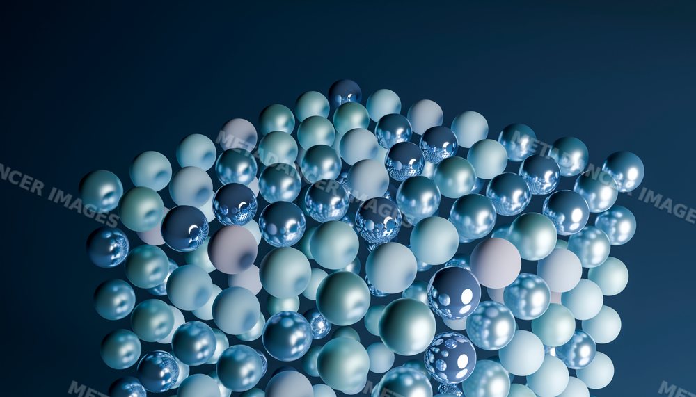 A cluster of 3d floating blue spheres with metallic and matte finishes