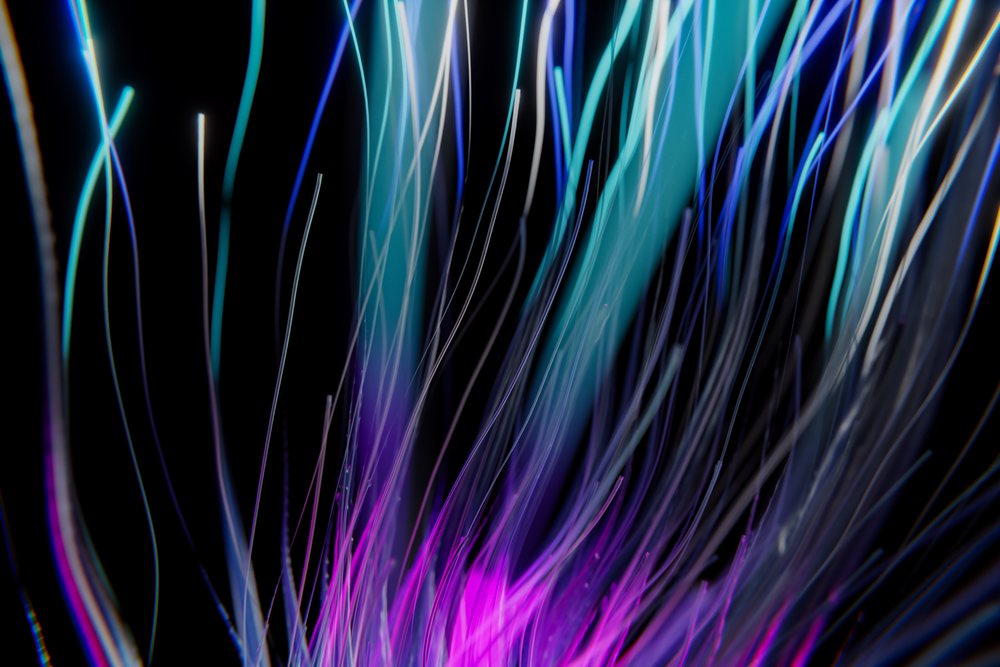 Abstract render of flowing colorful light strands in blue and purple on a dark background.