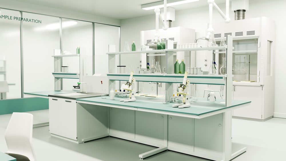 Clean laboratory workspace with microscopes, glassware, flasks, and green bottles organized on tables and shelves under fluorescent lighting.
