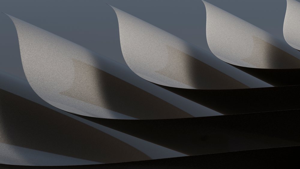 Layered curved and folded papers form an abstract monochrome pattern with smooth textures and shadows.