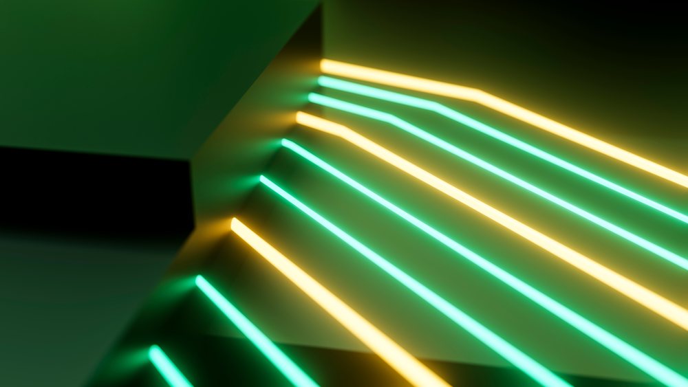 Abstract digital illustration depicting parallel green and yellow neon light bars glowing on a dark background.