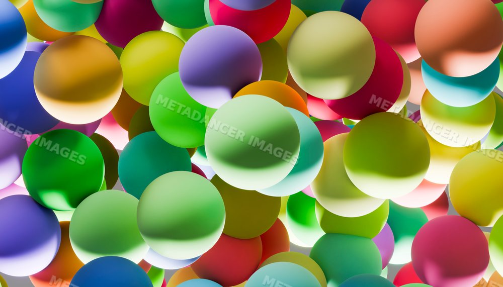 Colorful floating spheres create a vibrant abstract pattern