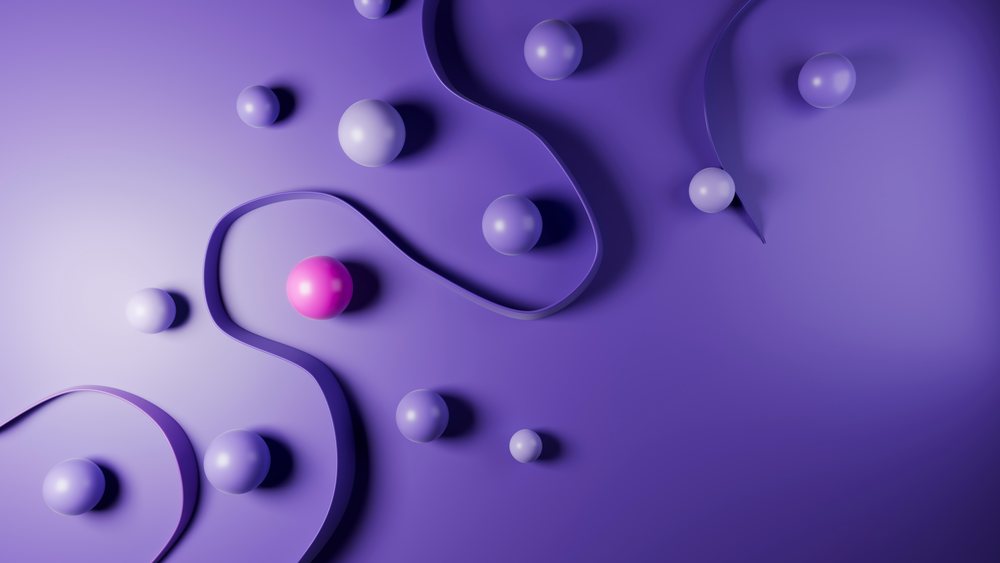 Digital 3D illustration showing smooth purple spheres and a pink sphere with a curved ribbon on a smooth purple background.