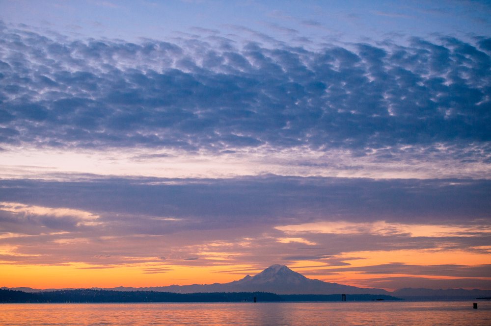 Sunset over Mount Rainier and waters, shington, Seattle Ferry, Bainbridge Island, WA, USA.