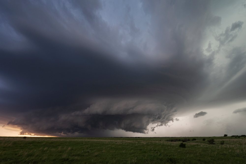Supercell storm forming, Kansas over open grassland in Tornado Alley, United States, Storm Chasing, Weather, Environmental Issues, Herrington.