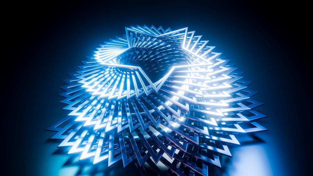 Rotating neon star sculpture glowing blue against a dark background with reflective surfaces.