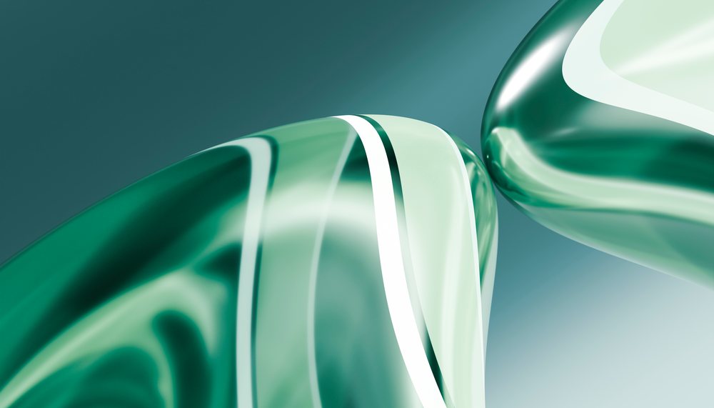 Green transparent curved glass abstract shapes with white stripes and smooth reflective surface in studio lighting.