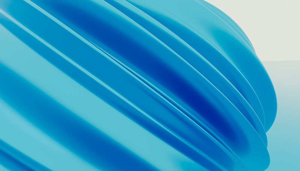 Blue glossy curved abstract shapes forming a modern digital artistic composition.
