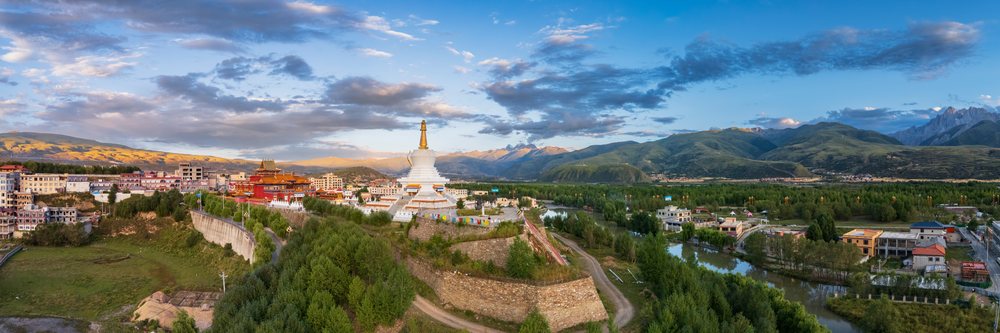 Zhu de commander in chief and wushigeda living buddha memorials at Sunset, Garze, Sichuan Province, People's Republic of China.