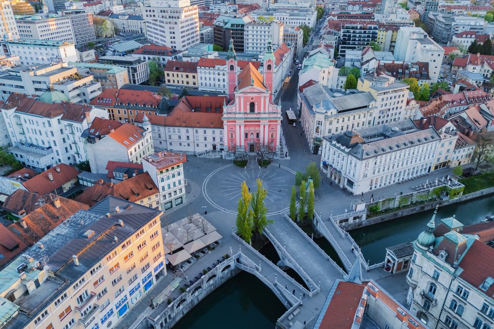 Aerial view of Prešernov Square and the Triple Bridge at Sunrise, landscape, cityscape, Ljubljana, Slovenia.
