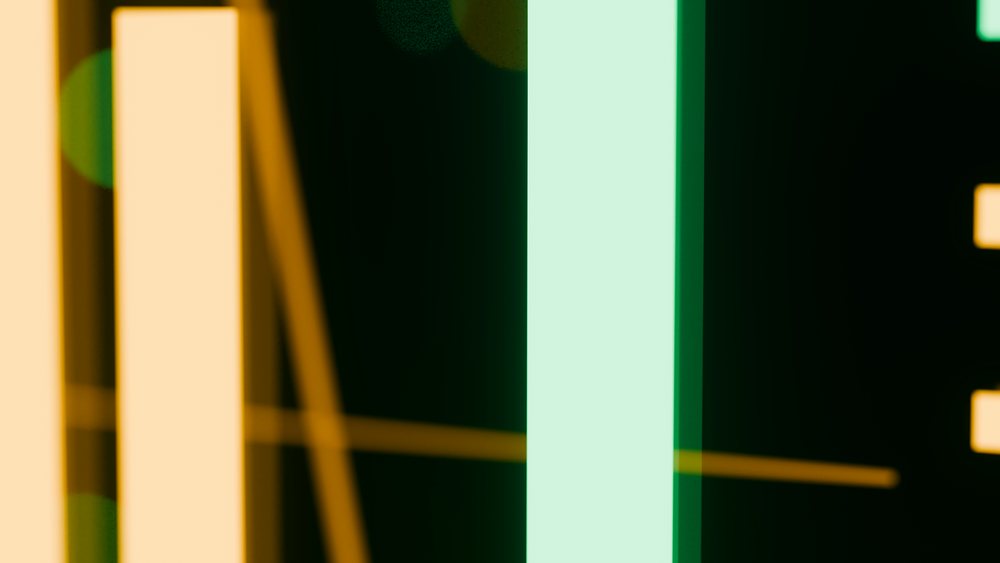 Vertical glowing light bars and geometric light streaks create a vibrant abstract pattern on a dark background.