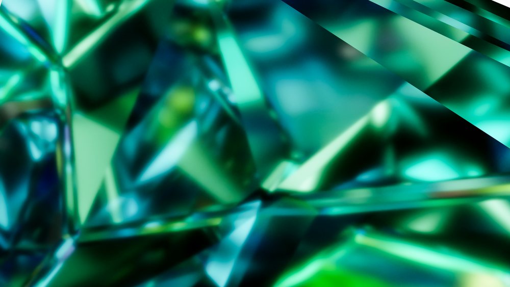 Abstract blue and green geometric crystal shapes with colorful reflections and refractions in a faceted pattern.