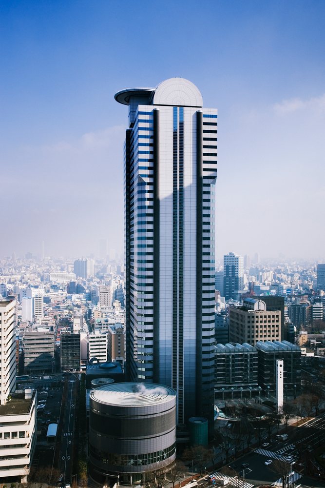 Shinjuku I-Land Tower skyscraper's winter urban business district under a clear sky, Japan, Asia.